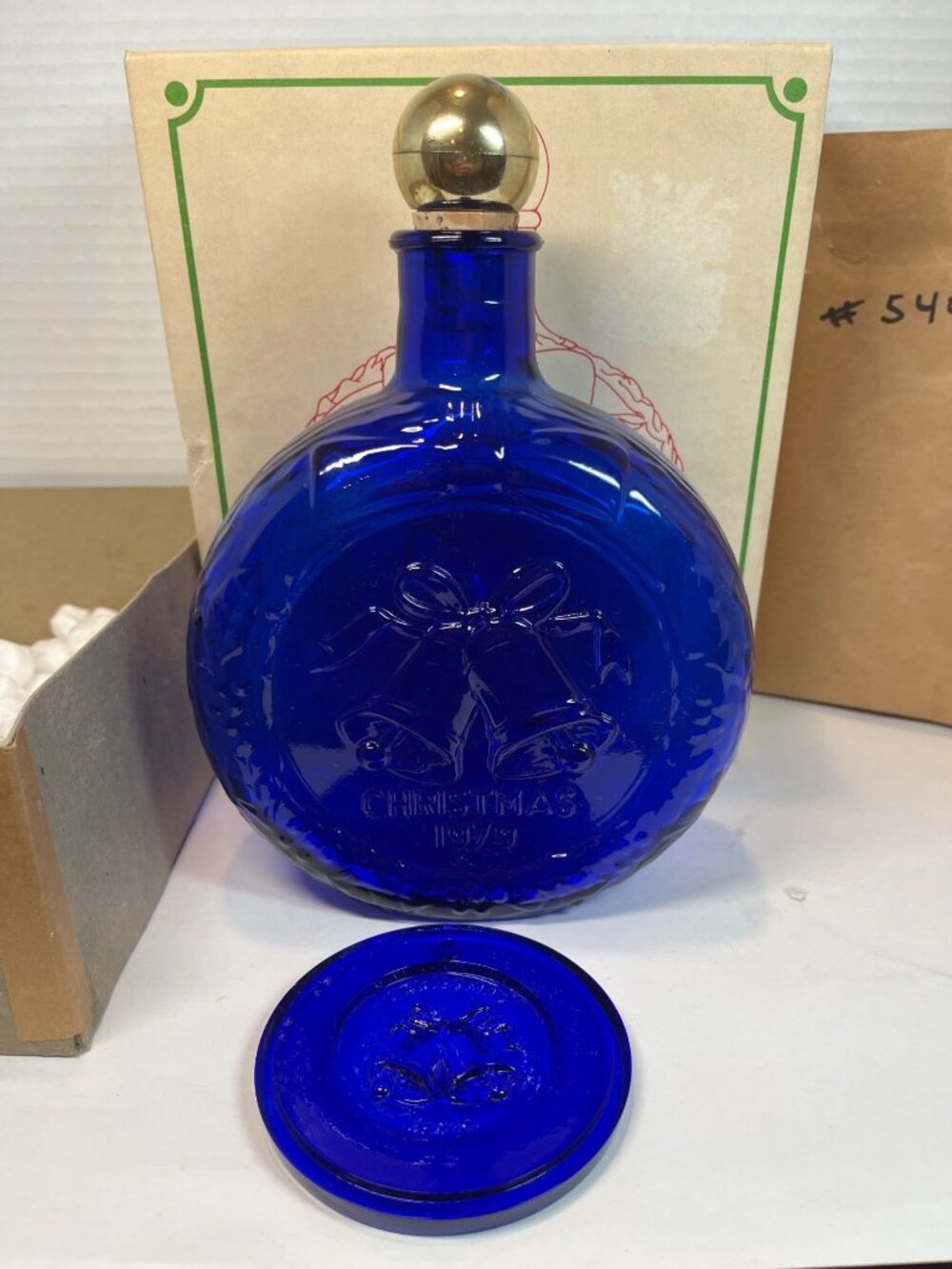 Christmas 1979 First Edition Blue Glass Collectors Decanter with Gold Stopper an